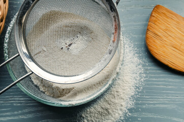 Flour beetles, parasites in wholemeal flour through a metal sieve