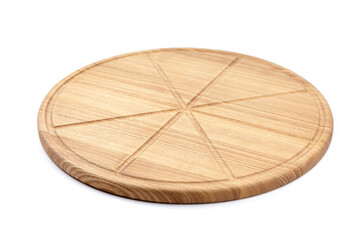 Round wooden pizza cutting board with slice grooves isolated on white