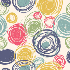 Abstract pattern with circles drawn with dry brush and colored ink.