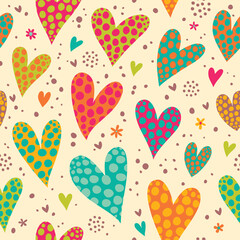 Seamless pattern with bright polka dot hearts.