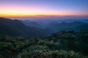 Sunset over the mountain range with colorful sky and amazing landscape on Doi Langka Luang 2,031 metres (6,660 ft) at Khun Chae National Park locate in Amper. Wiangpapao , Chaingrai district Thailand.