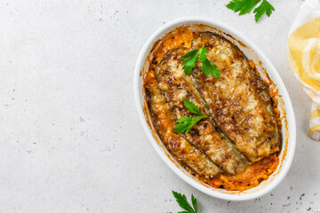 Healthy eggplant casserole. Space for text, top view.