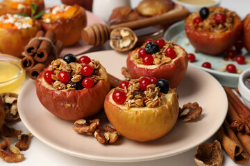 Concept of tasty food with baked apples, close up