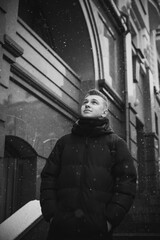 Fototapeta na wymiar Portrait of young blonde guy Nordic appearance, lifestyle of young people. Handsome guy close up, winter day thinking about something
