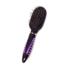 Massage comb for combing women's hair. Plastic brush with metal corners for detangling hair. On an isolated white background. Close-up.