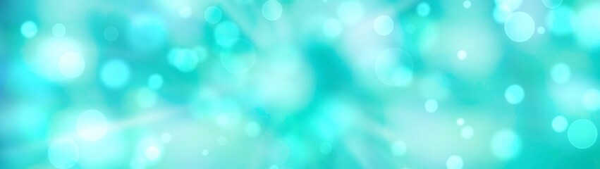 Spring background - abstract banner - green, turquoise blurred bokeh lights with sunbeams
