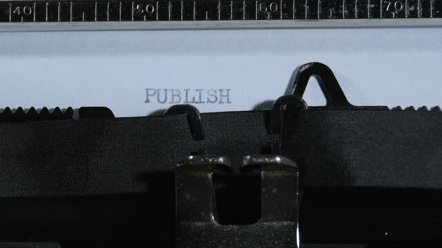 Typing PUBLISH with an old manual typewriter