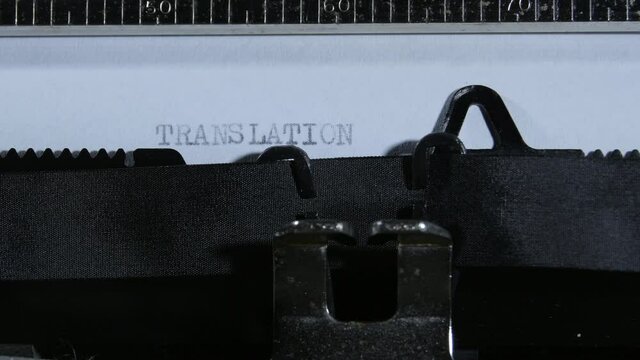 Typing TRANSLATION with an old manual typewriter