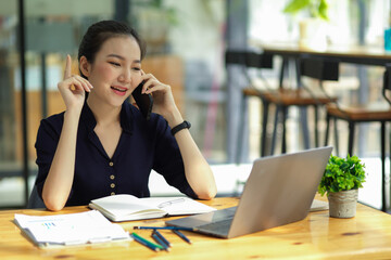 Successful businesswoman or female entrepreneur on the phone call