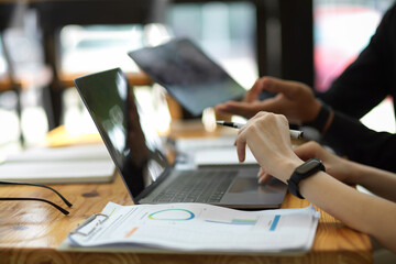 Financial management team working together at the office.