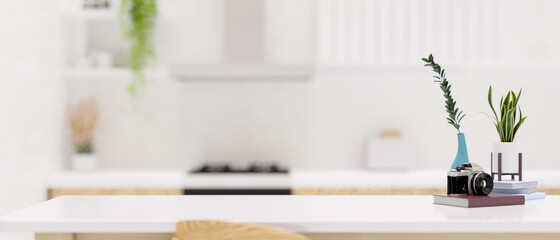 Dining tabletop with copy space over blurred comfortable white kitchen room