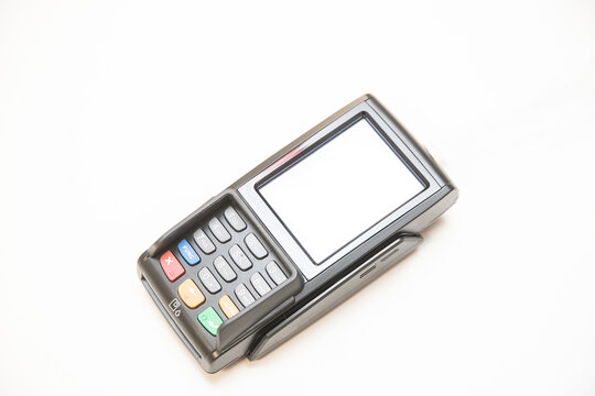 Terminal. On the front side there is a 3.5-inch touchscreen and keyboard. There is a slot for cards on the bottom end of the terminal, and a magnetic stripe reader on the right.