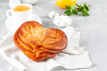 French buns with sugar. French pastry in palm leaf or butterfly shape. Homemade buns, plushka