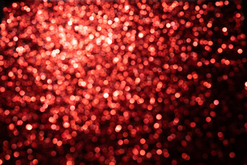 Obraz na płótnie Canvas Red festive sparkling background. Backdrop for Valentine's Day.