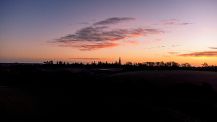 Sunrise over the village of Great Finborough in rural Suffolk, UK