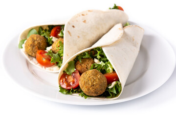 Tortilla wrap with falafel and vegetables isolated on white background