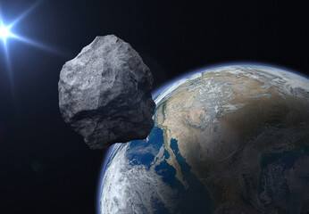 Asteroid approaching planet Earth. Elements of this image furnished by NASA.