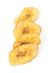 Banana chips isolated on white background. Healthy alternative snack.