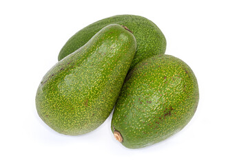 Whole green avocado fruits on a white background