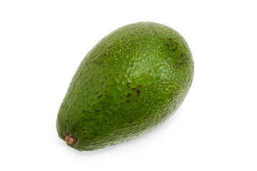 Whole green avocado fruit on a white background
