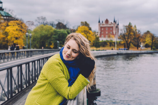 Woman in Stockholm Enjoying View from Bridge