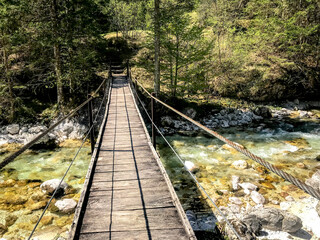 Fototapeta premium wooden bridge in Bovec village in Triglav National Park, Slovenia
