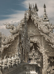 Chiang Rai, Thailand - Sep 05, 2020 : Elaborate sculptures at the famous Wat Rong Khun (White Temple) in Chiang Rai, Thailand. Selective Focus.