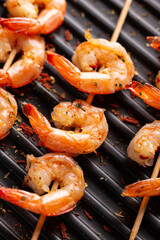 Freshly cooked shrimps on a grill