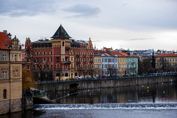 Scenic view of the Old Town architecture over Vltava river in Prague, Czech Republic.