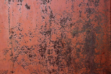 Shabby old design concept of rusty metal surface, red-brown texture of the layout, background for creative wallpaper