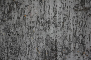 Rough gray roofing felt material with white spots and vertical stripes on the surface close-up texture of industrial background