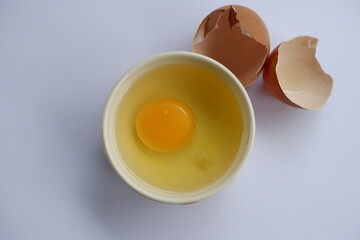 Crack an egg into a small bowl