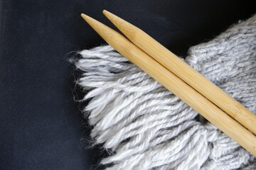 The sharp part of knitting needles and knitting yarn