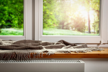 Spring, a window with a sill and an empty space on a beautiful sunny day 