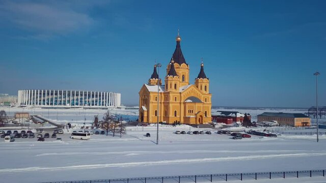 4K Aerial Footage of the Winter View to Alexander Nevsky Church with the background to the snowy Nizhny Novgorod city, Russia
