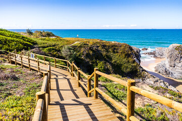 Fototapeta na wymiar Wooden walkway by Espingardeiro Beach, Alentejo, Portugal