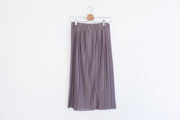 Skirt is clothes hanger on white background.close up.