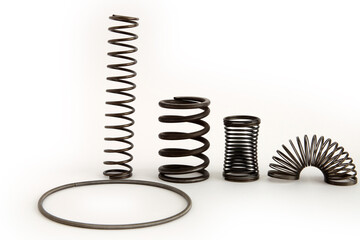 assorted steel spring kits on a white background