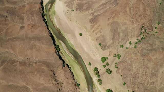 Aerial landscape view of river in Gobi desert, Mongolia.