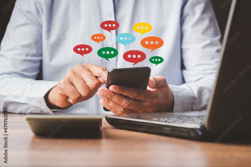 Poster social network and live chat chatting concept. close-up of hands using mobile phone with colorful ch