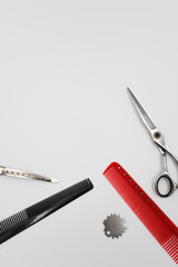 set of professional stylist tools on a light background