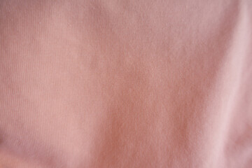 Top view of simple light pink cotton jersey fabric
