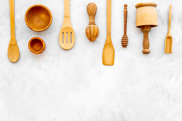 Cooking pattern with wooden kitchen utensils and cookware