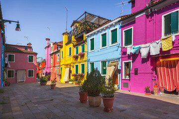 Fototapeta na wymiar Burano island street, colorful houses in the Venice lagoon. Italy