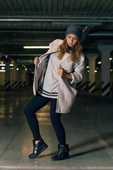 girl posing in the parking