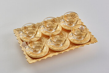 Gold and silver tray, zinc handmade white background isolated style.