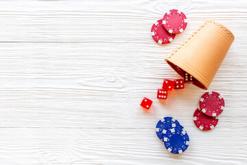 Red dices and gambling chips for poker. Casino games background