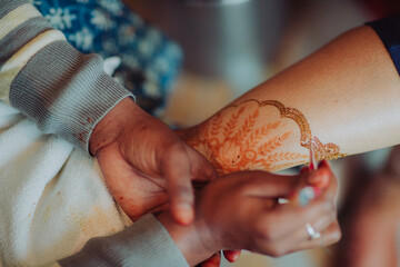 henna tattoo on hands