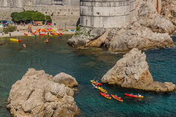 DUBROVNIK, CROATIA - MAY 31, 2019: Kayaking in the West harbor of Dubrovnik, Croatia
