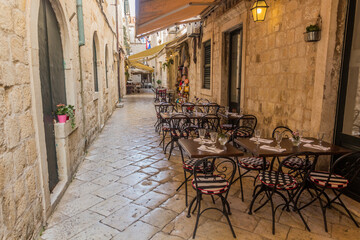 Fototapeta na wymiar Small open air restaurant in the old town of Dubrovnik, Croatia